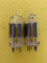 Load image into Gallery viewer, Matched Pair RCA Clear Top 7AU7 Vacuum Tubes Valves NOS NIB 6SN7 Substitute With Adapters