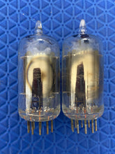 Load image into Gallery viewer, Matched Pair RCA Clear Top 12AU7 12AU7A ECC82 Vacuum Tubes Valves Steel Support Rods