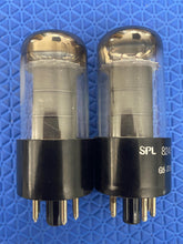 Load image into Gallery viewer, Matched Pair General Electric GE 6V6 6V6GT Vacuum Tubes Valves Copper Support Rods Black Plates Silver Tops Clear Bottles NOS NIB