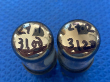 Load image into Gallery viewer, Matched Pair General Electric GE 6V6 6V6GT Vacuum Tubes Valves Copper Support Rods Black Plates Silver Tops Clear Bottles NOS NIB