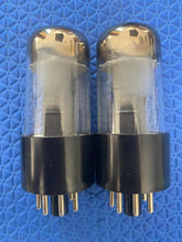 Load image into Gallery viewer, Matched Pair General Electric GE 6V6 6V6GT Vacuum Tubes Valves Copper Support Rods Black Plates Silver Tops Clear Bottles NOS NIB