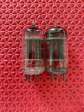 Load image into Gallery viewer, Matched Pair RCA 5963 12AU7 12AU7A Vacuum Tubes Valves Black Plate Industrial-Grade
