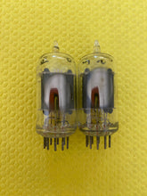 Load image into Gallery viewer, Matched Pair RCA Clear Top 12AU7 12AU7A Vacuum Tubes Valves Steel Support Rods NOS-Testing
