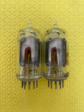 Load image into Gallery viewer, Matched Pair RCA Clear Top 12AU7 12AU7A Vacuum Tubes Valves Steel Support Rods NOS-Testing
