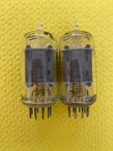 Load image into Gallery viewer, Matched Pair RCA Clear Top 12AU7 12AU7A Vacuum Tubes Valves Steel Support Rods NOS-Testing
