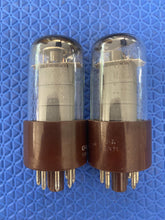 Load image into Gallery viewer, Matched Pair General Electric GE 6V6 6V6GT 6V6GTY 6P6 6P6P Vacuum Tubes Valves Milspec Clear Bottle Gray Plates NOS-Testing

