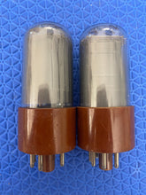 Load image into Gallery viewer, Matched Pair Raytheon 6V6 / 6V6GTY / JAN-CRP-6V6GTY / 6P6 / 6P6P Vacuum Tubes Valves Milspec Gray Bottle Black Plates Micanol Bases
